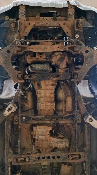 Захист двигуна, КПП, радіатора, роздатки і редуктора для Nissan Navara II D22 1997-2005 KOLCHUGA WhiteCover 4.1326.00 фото ##SPECS## Об'єм двигуна: V-2,5 D | Примітка: МКПП